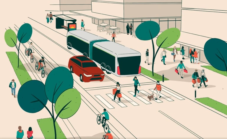 Urban street scene with pedestrians, cyclists, cars, buses, trees, and crosswalks showing sustainable transportation